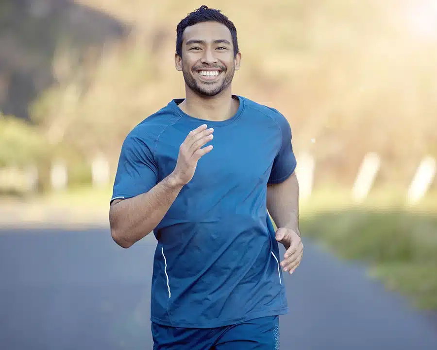 Young man enjoying active lifestyle after successful SMILE surgery by Best LASIK Surgeons doctor